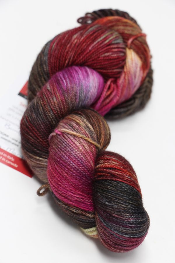 Fingering weight Serenity 20 yarn by Zen Yarn Garden in soft, natural tones, displayed in a close-up of the yarn skein.