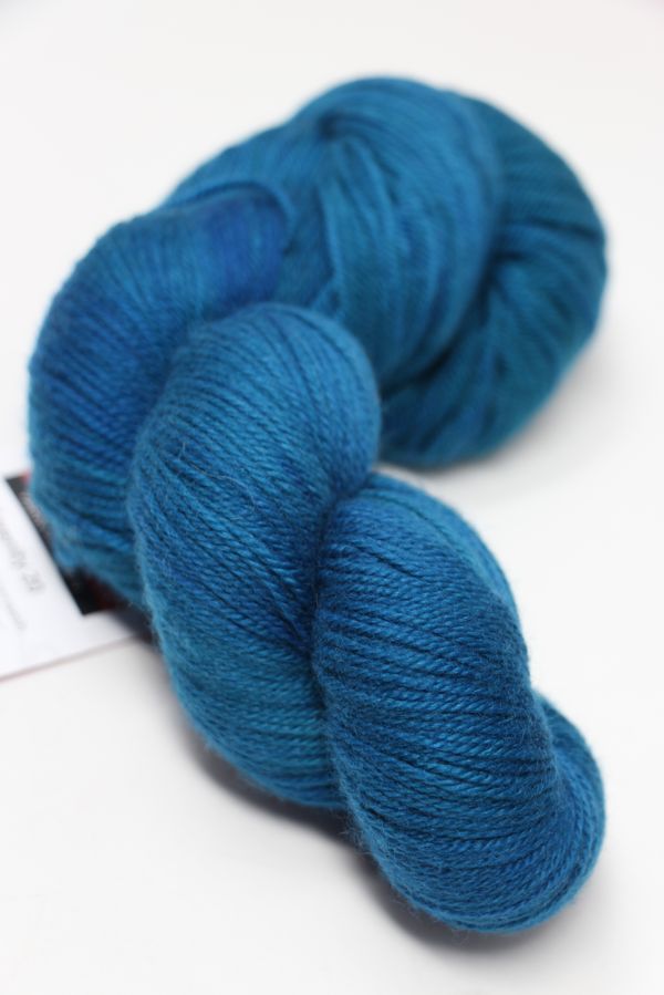 Fingering weight yarn by Zen Yarn Garden in Blue Hawaii colorway from the Serenity 20 collection.