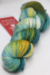 Close-up of Zen Yarn Garden Serenity 20 fingering weight yarn in new apple green color, showcasing soft, high-quality fiber.