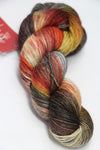 Fingering weight yarn from Zen Yarn Garden's Serenity 20 collection in a vibrant Razzle color, shown in a close-up of the yarn skein.
