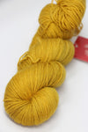 Fingering weight yarn from Zen Yarn Garden's Serenity 20 collection in Bumblebee color, featuring vibrant yellow and black hues.