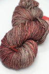 Fingering weight yarn from Zen Yarn Garden's Serenity 20 collection in soft pink with subtle tonal variations.