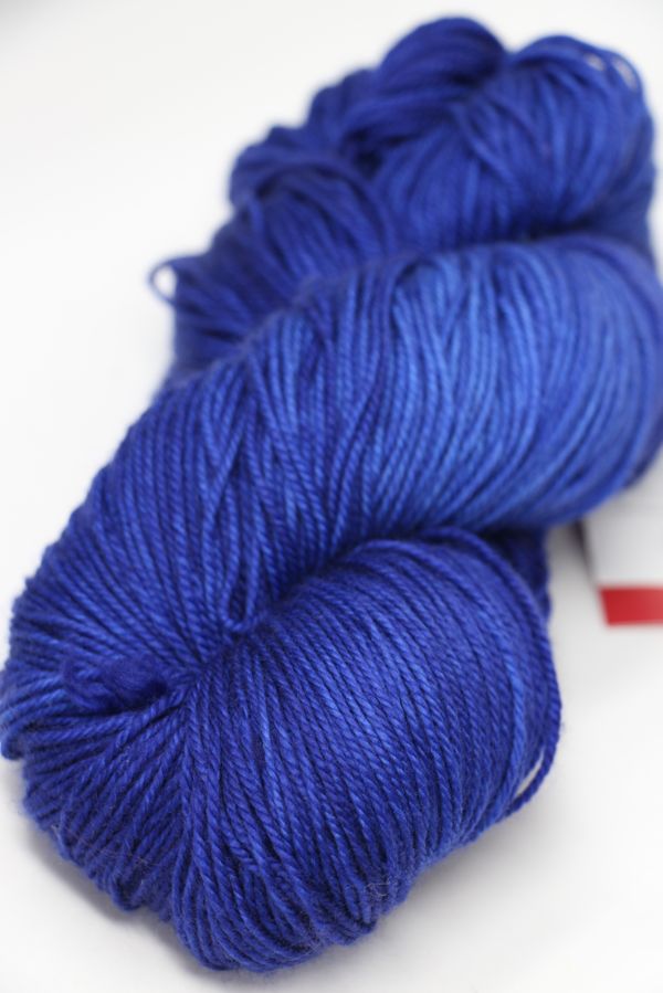 Fingering weight yarn from Zen Yarn Garden's Serenity 20 collection in a soft, variegated colorway, displayed in a close-up shot.