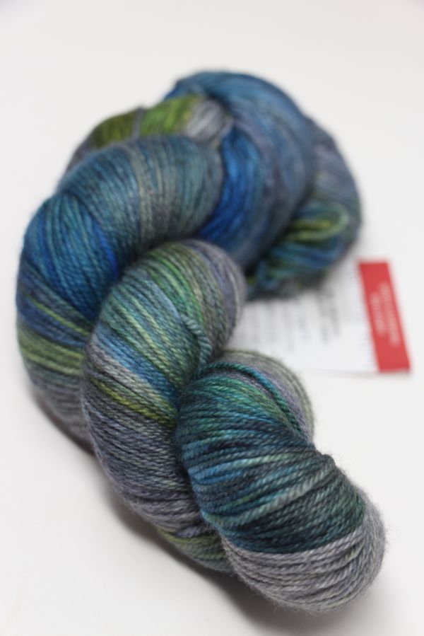 Fingering weight yarn from Zen Yarn Garden's Serenity 20 collection in a soft lake mist colorway, displayed in close-up.